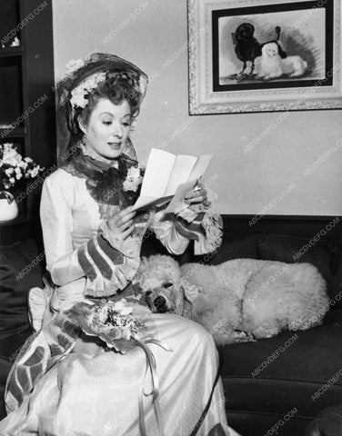 candid Greer Garson and her poodle dog behind the scenes 3104-18