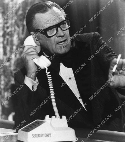 William Holden on the telephone film The Towering Inferno 3105-30