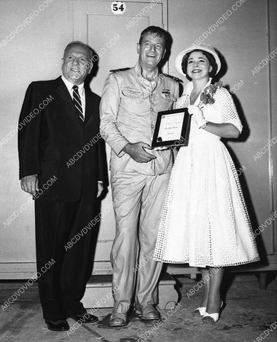 candid John Wayne gets some award on set The Wings of Eagles 3197-15