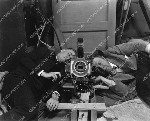 Rupert Hughes looking through the movie camera setting up his shot 3516-24