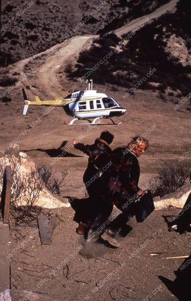 Rutger Hauer Mimi Rogers running from a helicopter film Wedlock 35m-12 ...