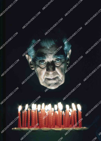 Boris Karloff blowing out his birthday cake candles 35m-14193