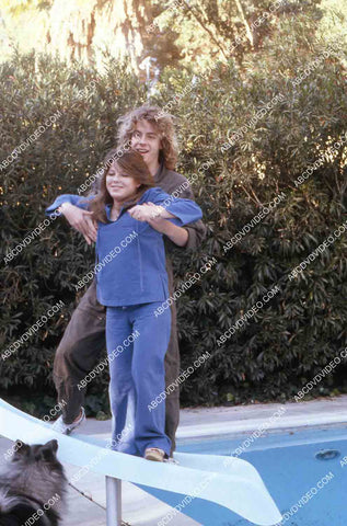 exclusive Leif Garrett sister Dawn Lyn play w dog by swimming pool in backyard 35m-14227