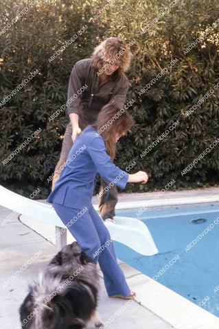 exclusive Leif Garrett sister Dawn Lyn play w dog by swimming pool in backyard 35m-14239