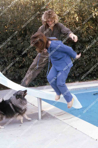 exclusive Leif Garrett sister Dawn Lyn play w dog by swimming pool in backyard 35m-14241