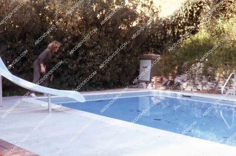 exclusive Leif Garrett sister Dawn Lyn play w dog by swimming pool in backyard 35m-14244