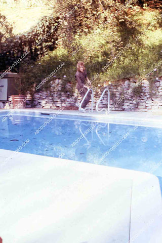 exclusive Leif Garrett sister Dawn Lyn play w dog by swimming pool in backyard 35m-14247