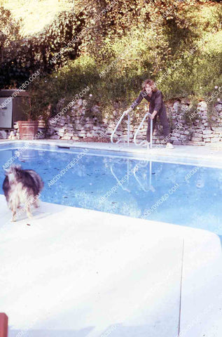 exclusive Leif Garrett sister Dawn Lyn play w dog by swimming pool in backyard 35m-14254