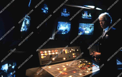 James Coburn in the tv control room film Looker 35m-14441