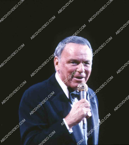 Frank Sinatra w the microphone singing away 35m-14941