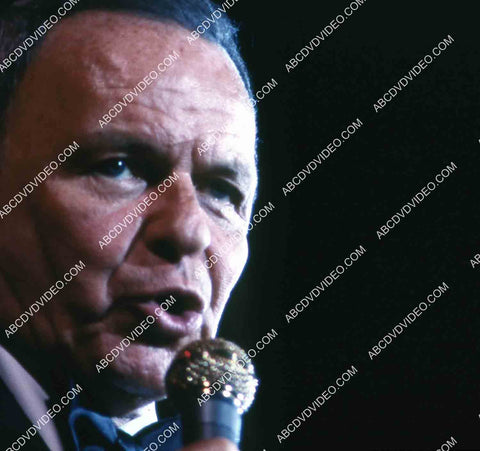 Frank Sinatra w the microphone singing away 35m-14944