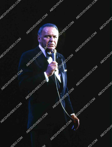 Frank Sinatra w the microphone singing away 35m-14946