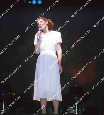 Eileen Barnett singing and doing standup on stage 35m-15204