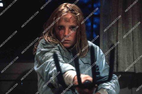 Amy Steel defending herself w a pitchfork film Friday the 13th Pt 2 35m-15445