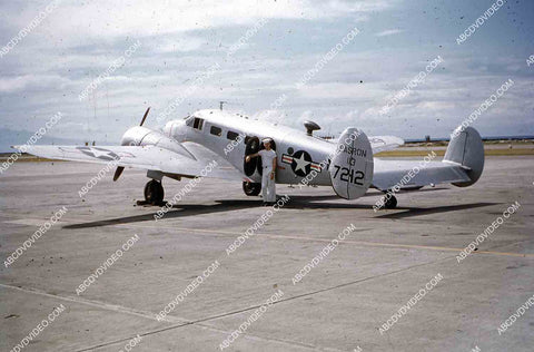 circa 1956 U.S. sailor tours historic Philippines from air in twin engine air force plane 35m-16337