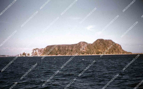 circa 1956 U.S. sailor tours historic Philippines from air in twin engine air force plane 35m-16359