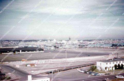 circa 1956 historic San Diego aircraft carrier USS Shangri-La arrives in port 35m-16563