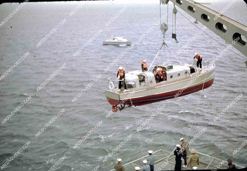 circa 1956 U.S. Naval operations USS Shangri-La raising launch to load up 35m-16587