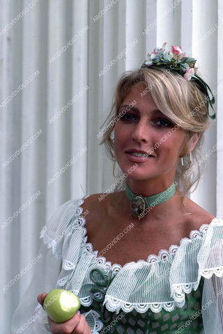 Joanna Pettet enjoys an apple between takes 35m-16738