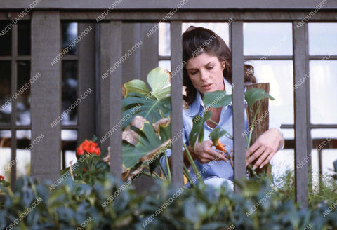 Katharine Ross tending her garden 35m-17287