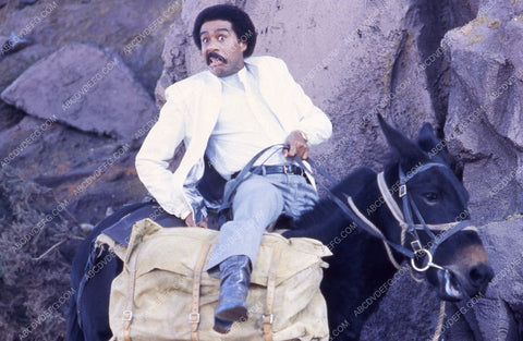 Richard Pryor riding a donkey film Superman III 35m-4745