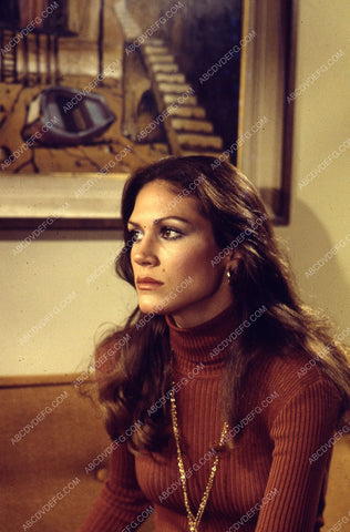 Pamela Hensley sitting on the couch 35m-5163