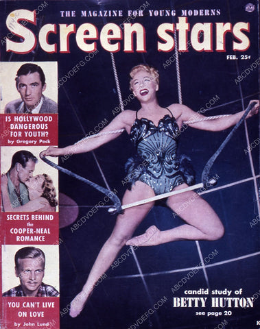 Betty Hutton on trapeze swing Screen Stars magazine cover 35m-5241