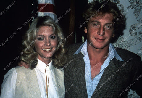 Olivia Newton-John & husband Lee Kramer at Beverly Hilton Hotel 35m-5512