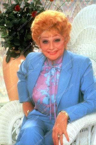 Lucille Ball sitting a large wicker chair 35m-5671