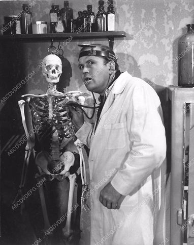 Rufe Davis gives medical examination to a skeleton film Code of the Outlaw 3655-08