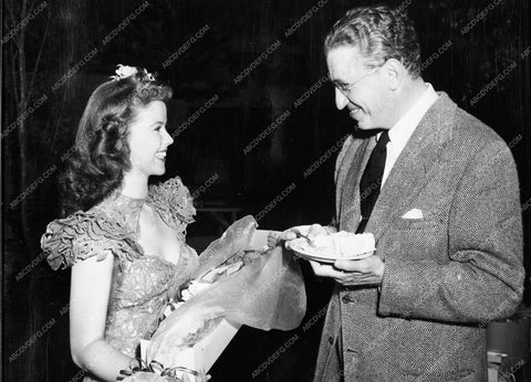 candid Shirley Temple David O. Selznick eating cake 4439-11