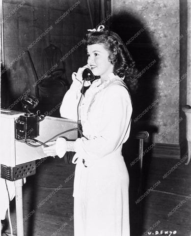 candid Shirley Temple on the telephone behind the scenes 4439-32