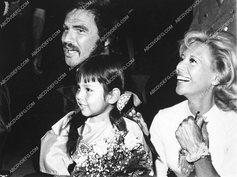 candid Burt Reynolds & Dinah shore arrive at some event 4464-02