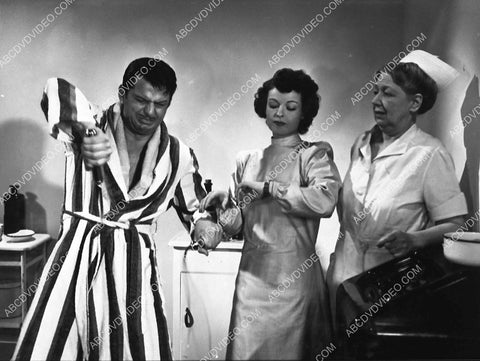 John Carroll gets a physical from Ruth Hussey film Bedside Manner 4581-04