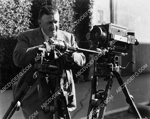 Karl Freund attaching a focus device to a movie camera I think 4588-08