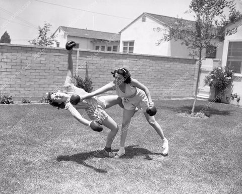 Universal Studios stunt girls rehearsing boxing between takes 45bx02-28