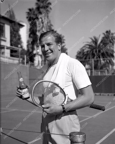 athletic Don Terry enjoys pepsi on the tennis court 45bx05-73
