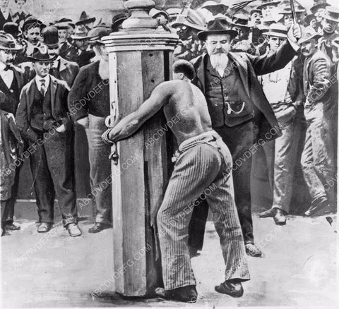 news photo man getting whipped at whipping post 45bx06-033