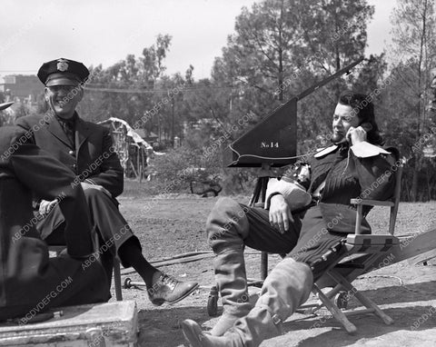 Cornel Wilde gets the remote phone behind the scenes Forever Amber 45fa-64