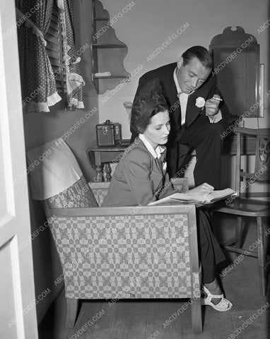 candid Peter Lorre Brenda Marshall relaxes going over the script 4b09-038