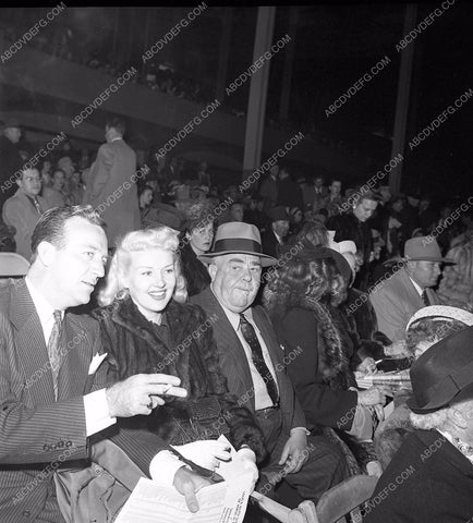 Betty Grable attends Louis B Mayer horse auction financial woes 4b09-399