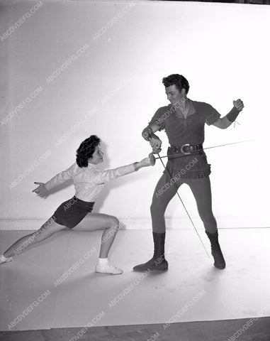 Cornel Wilde gives fencing lessons to babe Bandit of Sherwood Forest 4b09-463