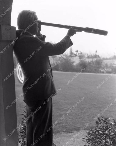 Hobart Bosworth at home with telescope 4b09-574