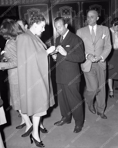 Fanny Brice signs autograph at film premiere 4b09-610