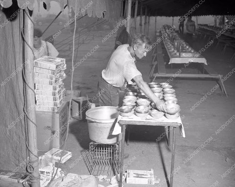 circus worker gets frosted flakes ready for a hungry crew 4b10-052