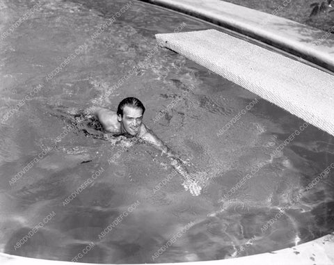 Douglas Fairbanks Jr. enjoys a swim at home 4b10-597