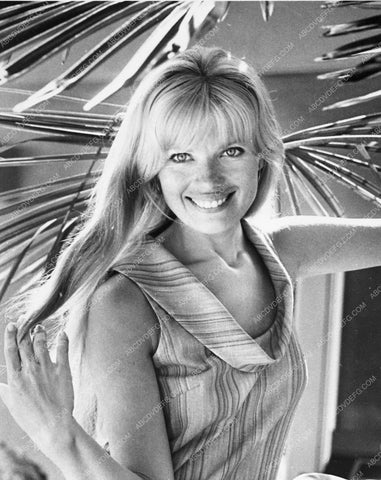 Marta Kristen running her finger through her hair 5388-23