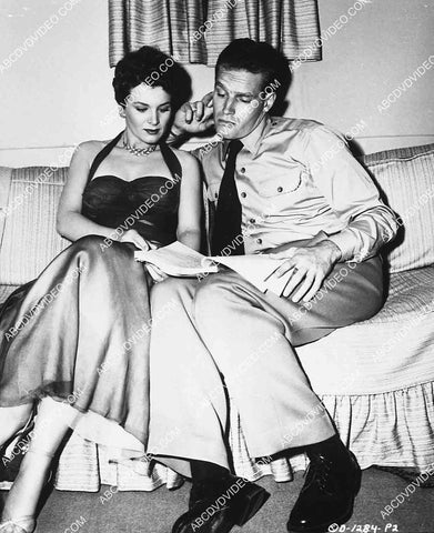 candid Lydia Clarke & Charlton Heston in his dressing room 5588a-023