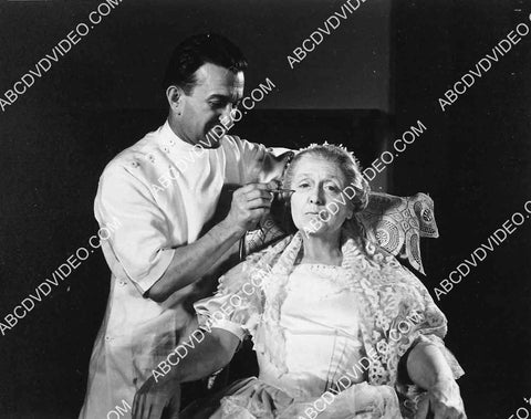 some lady gets Jack Pierce makeup treatment 5623a-07