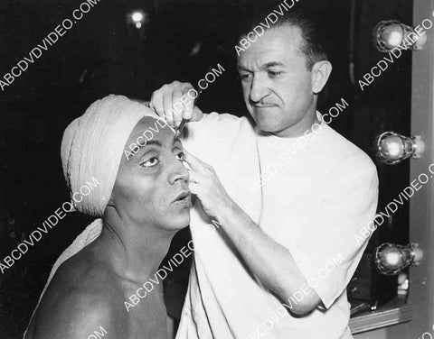 Jack Pierce does finishing makeup for Mischa Auer 5623a-21